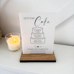 Elegant Black Personalised Wedding Cake Sign - Opaque Acrylic with Rustic Wooden Base for Customising Your Special Day
