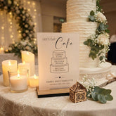 Elegant Black Personalised Wedding Cake Sign - Opaque Acrylic with Rustic Wooden Base for Customising Your Special Day
