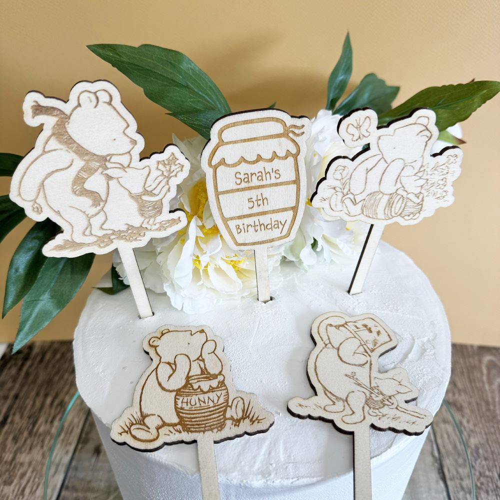 personalised-winnie-the-pooh-wooden-cake-toppers-x-5-childrens-birthday|LLWWPOOHCTX5|Luck and Luck| 1