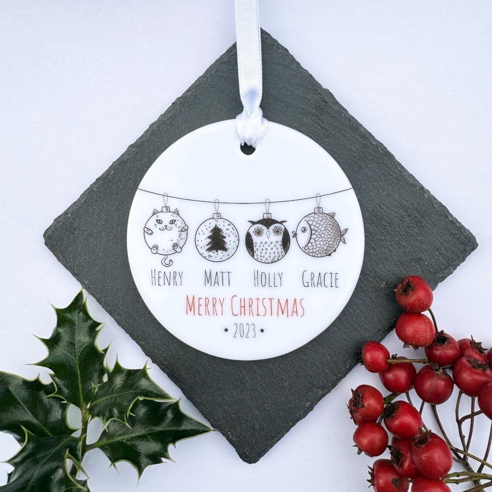 personalised-family-porcelain-bauble-with-characters-names-christmas|LLUVPORC5|Luck and Luck| 1